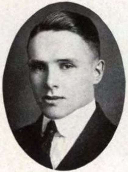 Oval portrait of the head and shoulders of a young man in a suit.