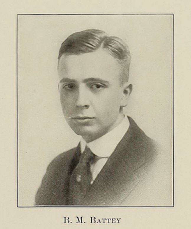 Formal portrait, head and shoulders, of a man in a suit in three quarter profile.