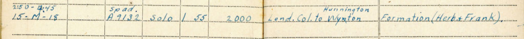 Excerpt from a printed form with blue fountain pen ink entries by Hooper documenting his flight on March 15, 1918, from London Colney to Wyton wth Herbert and Read.