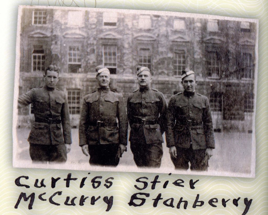 Four men in uniform at Oxford.